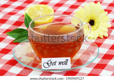 Get well card with cup of tea, lemon and cream gerbera daisy