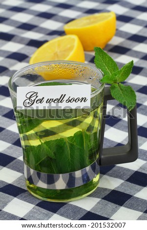 Get well soon card with mint tea and fresh lemon