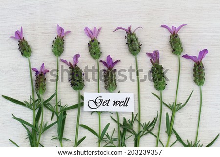 Get well card with lavender flowers on white wooden surface
