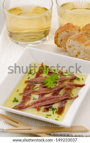 Spanish cuisine. Tapas. Marinated anchovies in olive oil. Selective Focus. Anchoas en aceite.