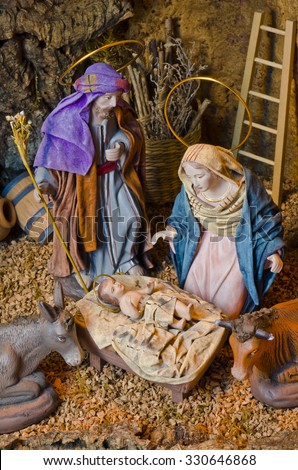 Nativity Crib. Figures of Baby Jesus, Virgin Mary and St. Joseph.