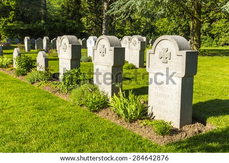 MONS, BELGIUM, JUNE 5 2015: German grave stones at the ST. SYMPHORIEN MILITARY CEMETERY near Mons, Belgium, remembering the solders from the first world war.