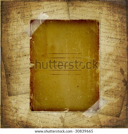 Torn yellow paper fastened with masking tape. Old parchment