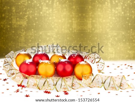 Christmas ball with greeting card on the abstract sparkling background