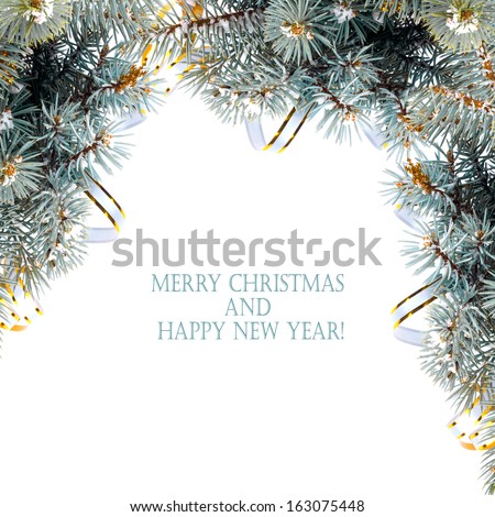 Christmas fir branch with gold streamers and stars on a white background isolated