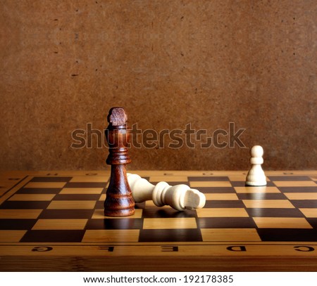 One chess king dominating another on the chessboard