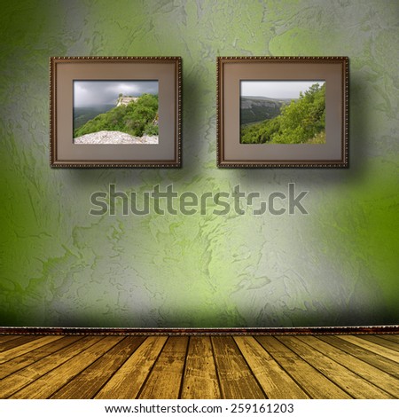 Photos of the Crimea in the old wooden frame on the wall Photos of the Crimea in the old wooden frame on the wall