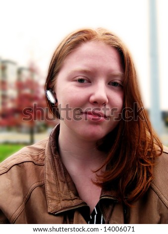 Woman with Wireless Headset with a gaussian blur applied.
