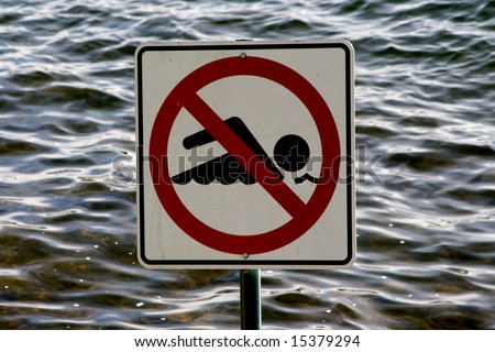 No Swimming Sign set against the waves of Lake Washington near Seattle.