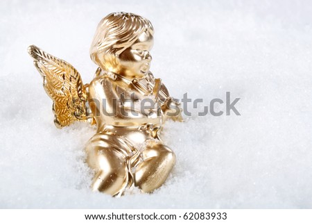 Christmas Angel on a snow - close up