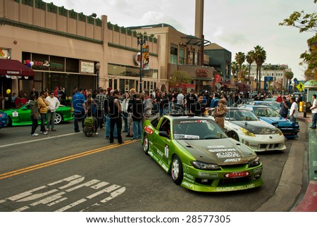 LONG BEACH, CA - APRIL 9: Cars from the formula drift event perform a parade to Pine Street to meet and greet with fans and pilots April 9, 2009 in Long Beach, California.