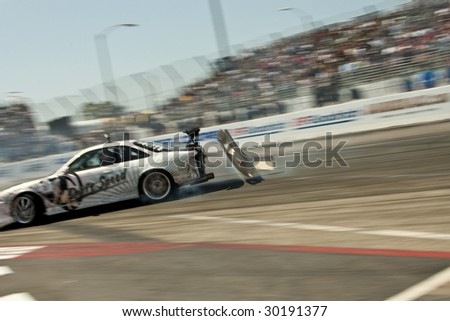 LONG BEACH, CA - APRIL 11: Quoc Ly loosing his back bumper in drifting action for Grand Prize during 2009 Formula Drift April 11, 2009 in Long Beach.