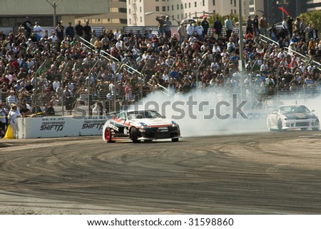 LONG BEACH, CA - APRIL 11 : Robbie Nishida in drifting action for grand prize during 2009 Formula Drift April 11, 2009 in Long Beach.