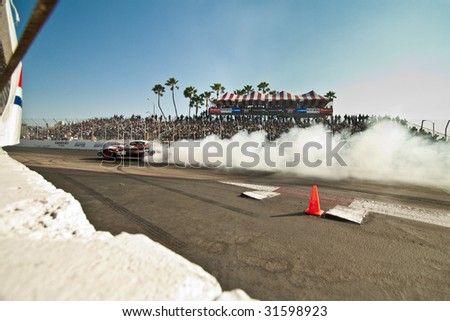 LONG BEACH, CA - APRIL 11 : Robbie Nishida in drifting action for grand prize during 2009 Formula Drift April 11, 2009 in Long Beach.