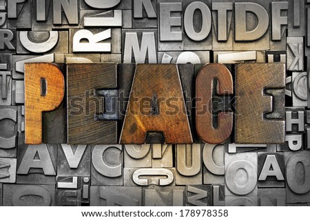 The word PEACE written in vintage letterpress type