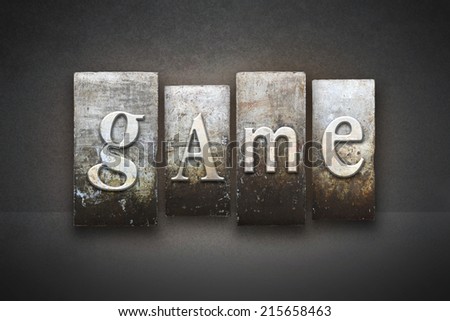 The word GAME written in vintage letterpress type