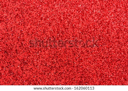 Red glitter (plus some dark red and a bit of white) background.