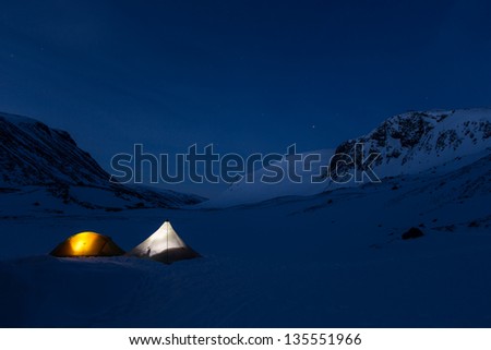 camping at night blue light