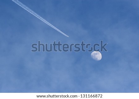 Airplane flying to the moon