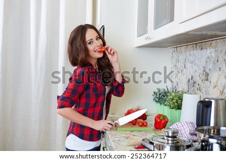 Young Woman Cooking. Healthy Food - Vegetable Salad. Diet. Dieting Concept. Healthy Lifestyle. Cooking At Home. Prepare Food