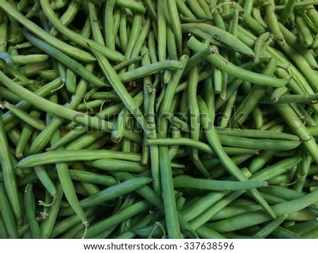Green Beans: Bright greens beans freshly picked from the field.