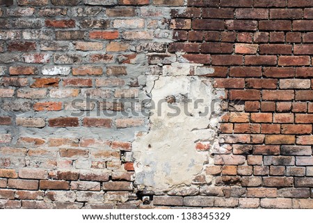 Weathered brick wall in New Orleans St Louis Cemetery #1.
