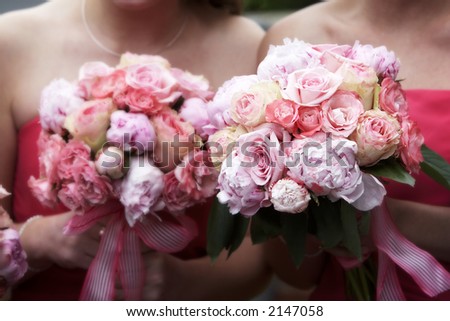 Bridal wedding bouquets of flowers, with a blurred effect on the backgrounf flowers, and focus on the flowers on the right