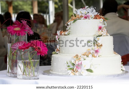 stock photo a beautiful wedding cake with a gorgeous candy flower 
