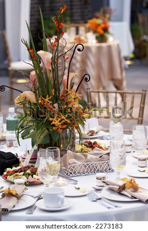 a wedding table is set for fine dining