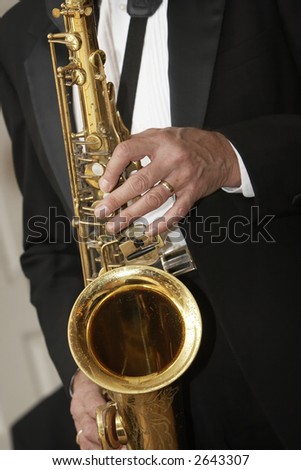 playing a brass horn - musical instrument