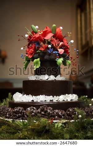 A cake from a wedding with candy flowers and rock sugar- please see my portfolio for many more wonderful and tasty cakes