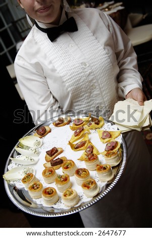 Stock photo wedding appetizers being served on a platter