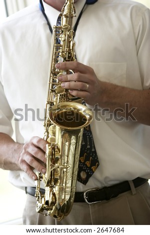 playing a brass horn - musical instrument