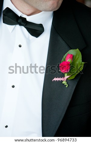 A man wearing a flower boutonniere