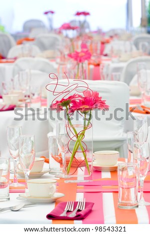 Wedding tables set for fun dining during a banquet or wedding event