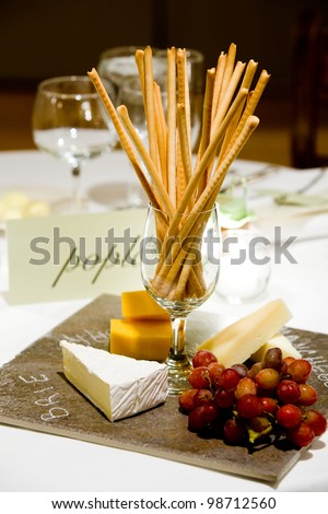 cheese and bread sticks set out during a catered event