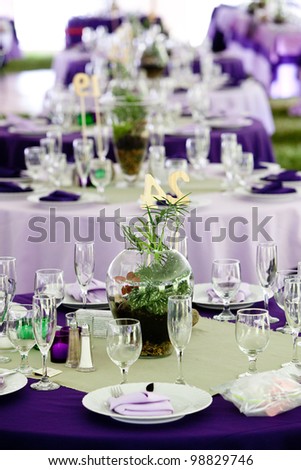 Wedding Tables Set Up For Fine Dining In Green And Purple, Unique ...