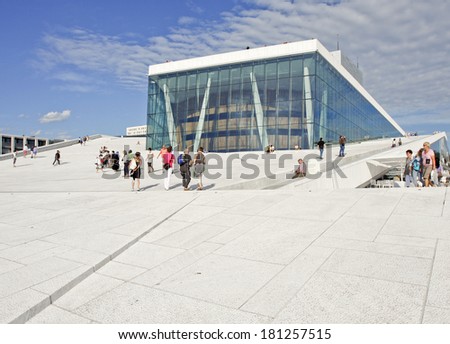 OSLO, NORWAY Ã¢Â?Â? JULY 09. The Opera House in Oslo City on July 09, 2010 in Oslo, Norway. Unidentified people in the area, on the roof. Glass and marble!