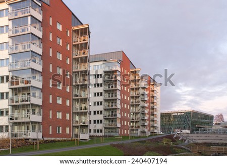 UMEA, SWEDEN ON NOVEMBER 15. Block of modern and newly built apartments on November 15, 2011 in Umea, Sweden. View of  flats in evening lit.