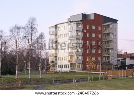 UMEA, SWEDEN ON NOVEMBER 15. Block of modern and newly built apartments on November 15, 2011 in Umea, Sweden. View of  flats in evening lit.