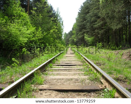 Old railway track in the forest, Russia