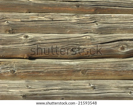 Fragment of old country colorless wooden house wall, useful as background