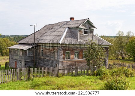 Old wooden house in the country, summer day
