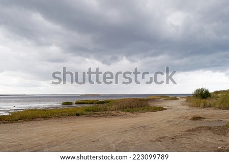 Sandy road along the coast of the White Sea near Severodvinsk, North Russia