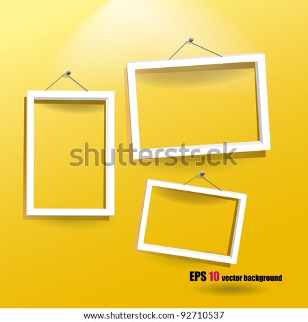 White Frames On The Yellow Wall