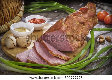 meat product lies on a wooden table