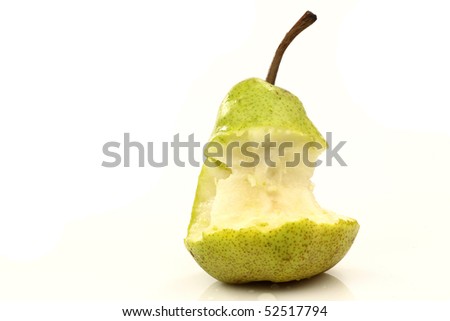 fresh juicy green pear with a bite missing on a white background