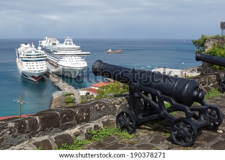 SAINT GEORGES, GRENADA - DECEMBER 14, 2013: Fort George with cruise ships in the harbour on December 14, 2013 in Saint Georges, Grenada, Caribbean