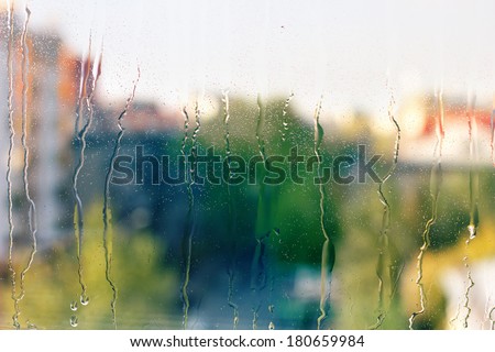 Drops of rain on window. Abstract background.