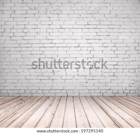 White brick wall with wooden floor
